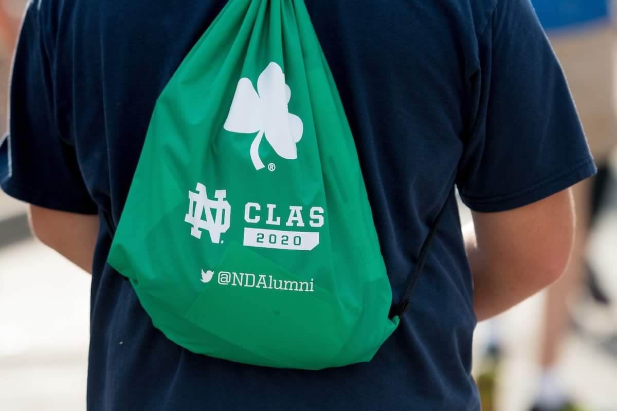 Student Wearing A Green Class Of 2020 Bag