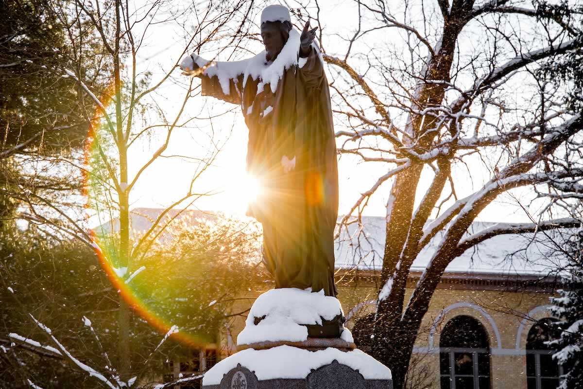Sacred Heart Jesus statue on a winter morning